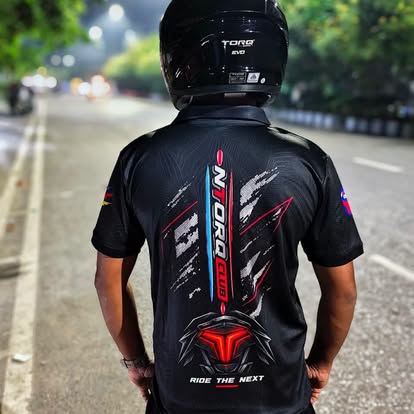 Back view of the NTORQ Club jersey worn by a rider